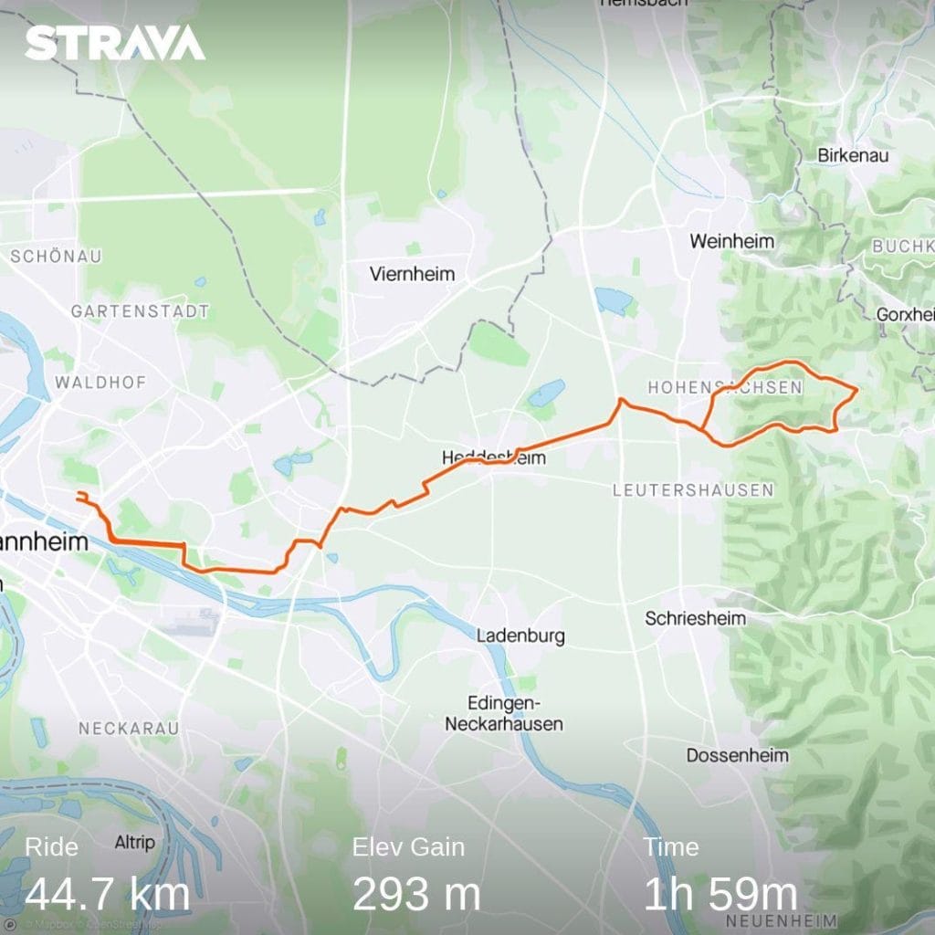 Clickable map provided by Strava of the area between Mannheim (city in SW Germany) on the left, and the westernmost part of the Odenwald mountain range on the right. The itinerary of the ride is marked as a red line (lasso shape, with a round climbing circuit between Hohensachsen and Leutershausen). Ride length (44,7 km), elevation gain (293 m) and moving time (01:59) are printed at the bottom of the map.
Clicking the map takes the reader to the respective workout on strava.com
